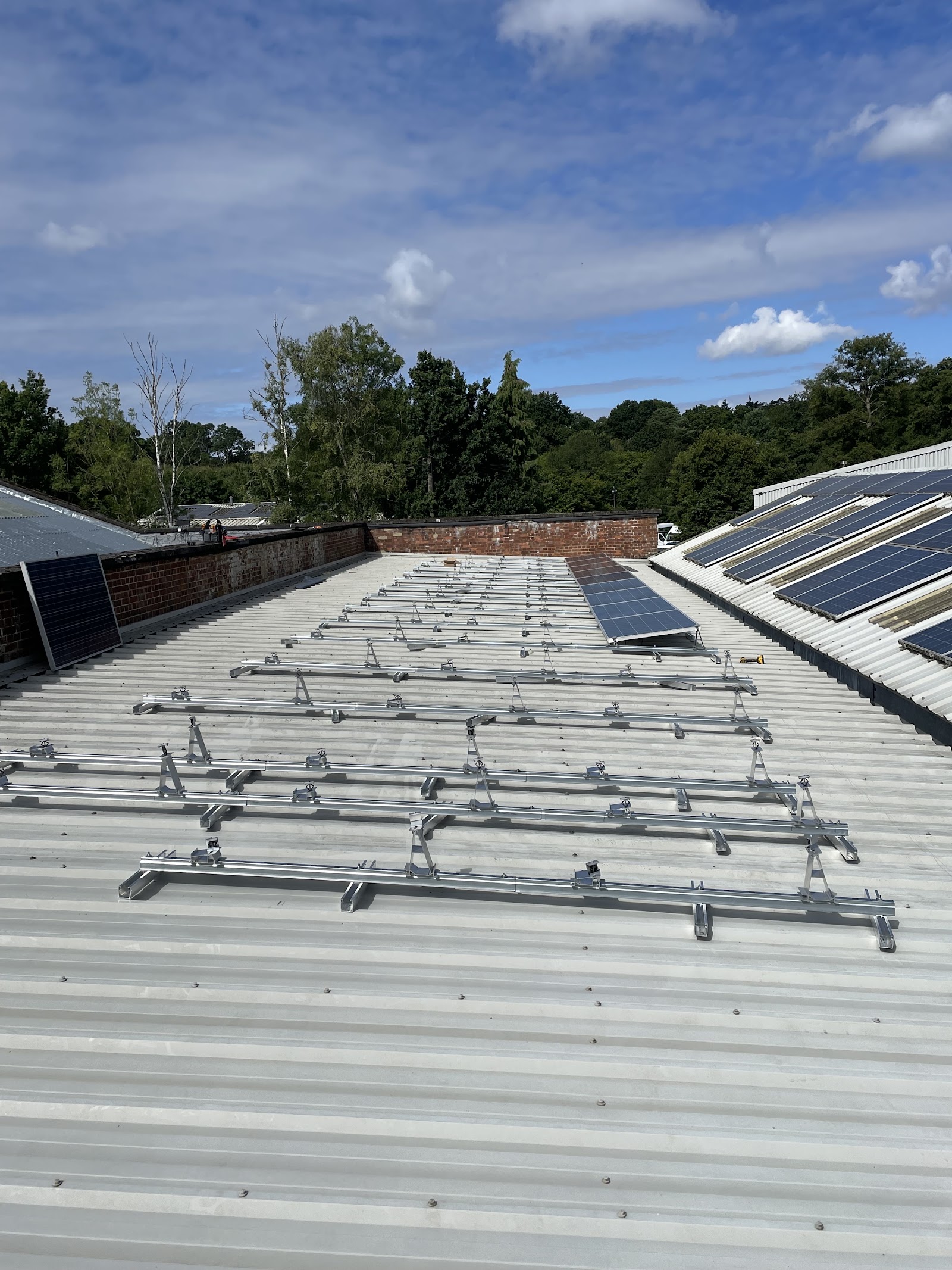 Solar mounting rails across a commercial roof