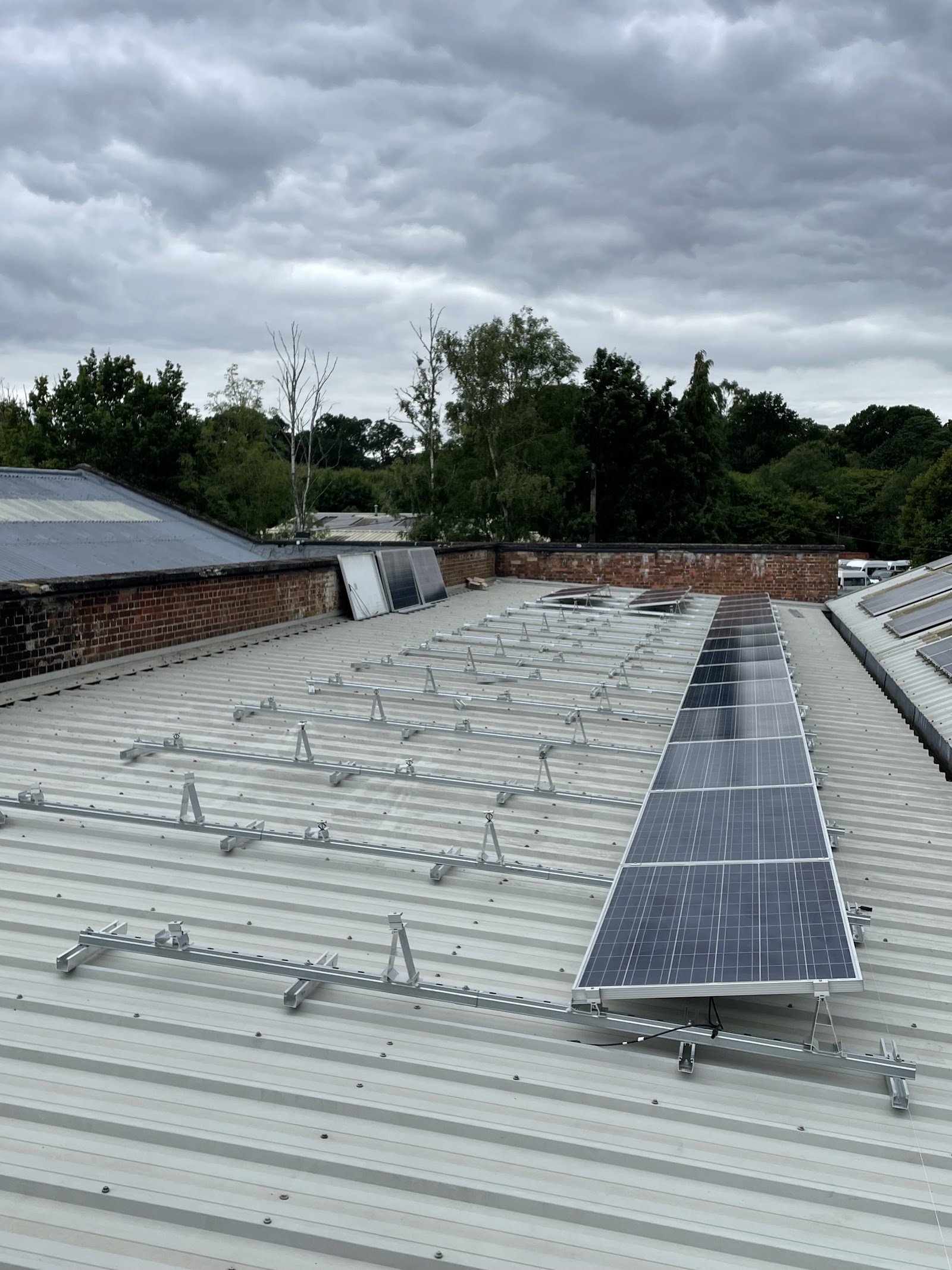 A commercial roof solar install in progress